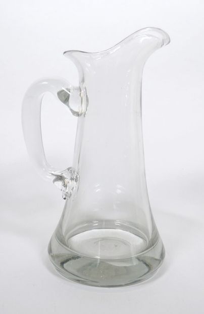 Ensemble en verre comprenant :
- Une bouteille...