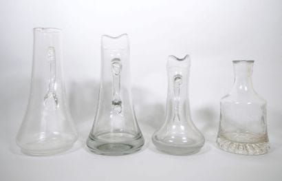 Ensemble en verre comprenant :
- Une bouteille...