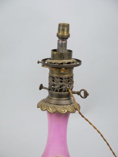 Pair of porcelain oil lamps with polychrome...