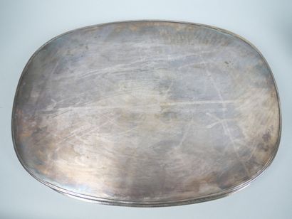 Part of a silver-plated tea service decorated...