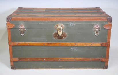 Travel trunk in studded leather, cardboard...