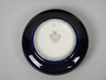 SEVRES
Reunion of 4 small blue porcelain...