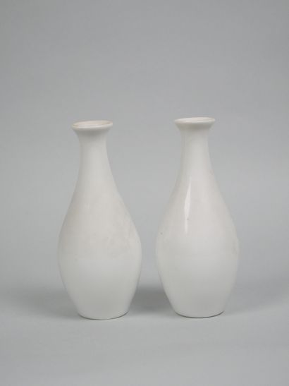 SEVRES
Pair of white porcelain baluster vases...