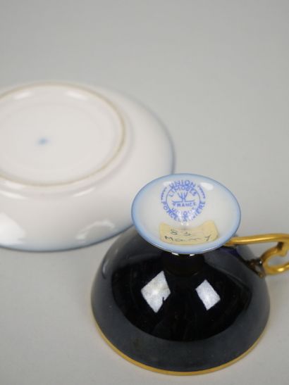 LIMOGES 
Set of three porcelain cups on pedestal...