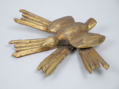 Reunion of two carved and gilded wood elements,...