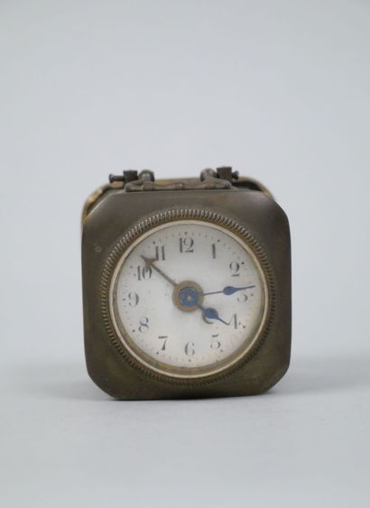 Small travel clock with white enameled dial...