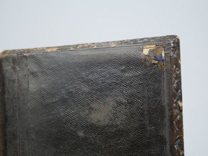 Wallet in embossed leather with floral decoration,...
