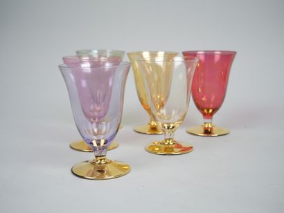 Part of a tinted and gilded glass service...