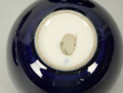 SEVRES
Reunion of 4 small blue porcelain...