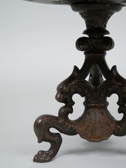 Bronze tripod bowl with relief decoration...