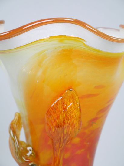 Orange-toned blown glass corolla vase decorated...