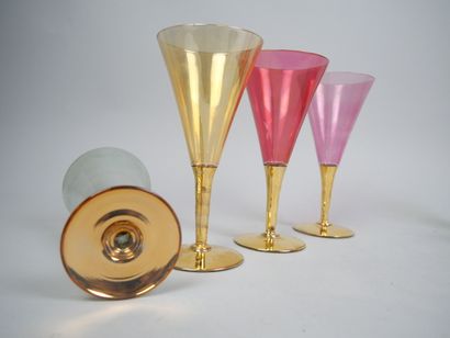 Part of a tinted and gilded glass service...
