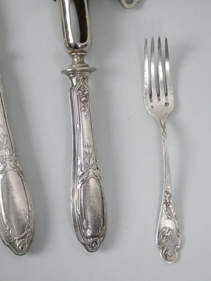 Silver flatware with ribbon and laurel leaf...