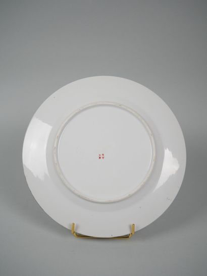 CHINA
Porcelain plate with polychrome decoration...