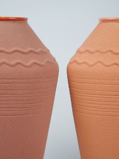 Reunion of two terra cota earthenware vases...