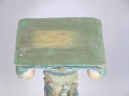 Wooden torso column with polychrome vine...