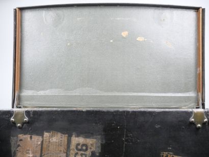 Important car trunk in wood covered with...