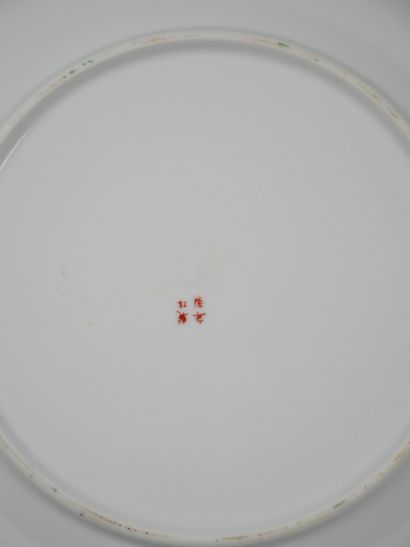 CHINA
Porcelain plate with polychrome decoration...