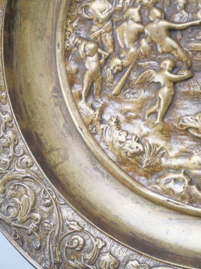 Bronze tripod bowl with relief decoration...