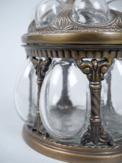 Oval blown-glass and metal cookie tin decorated...