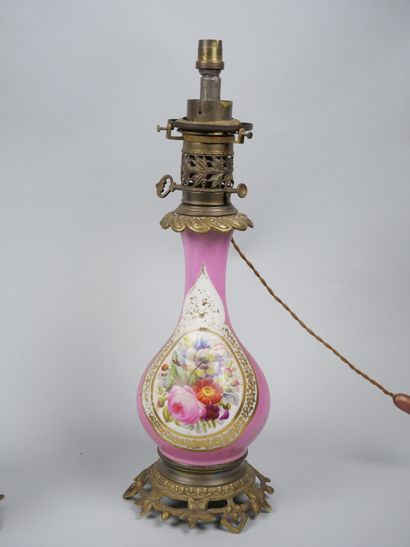 Pair of porcelain oil lamps with polychrome...