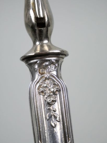 Silver flatware with ribbon and laurel leaf...