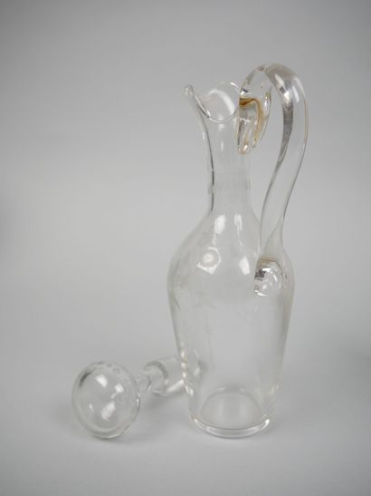 Pair of glass oil and vinegar cruets with...