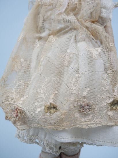 ARMAND MARSEILLE
Porcelain-headed doll with...