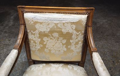 Moulded and carved natural wood armchair...