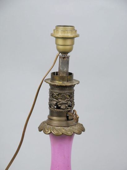 Pair of porcelain oil lamps with polychrome...