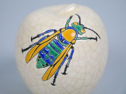 LONGWY 
Cracked earthenware apple with enameled...