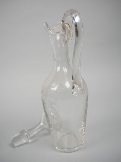 Pair of glass oil and vinegar cruets with...