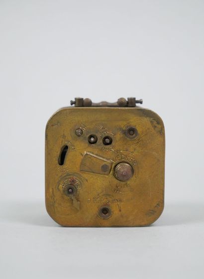 Small travel clock with white enameled dial...