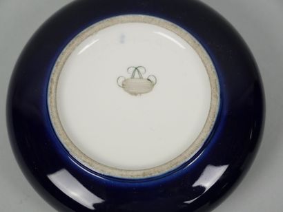 SEVRES
Reunion of 4 small blue porcelain...