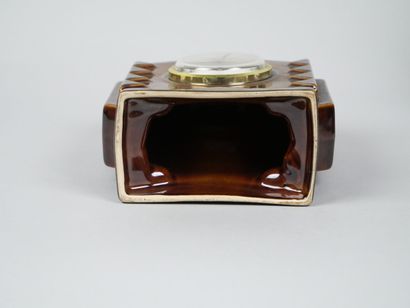 SAINT-CLEMENT
Reunion of brown-glazed earthenware...