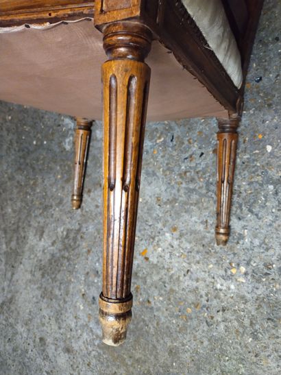 Moulded and carved natural wood armchair...