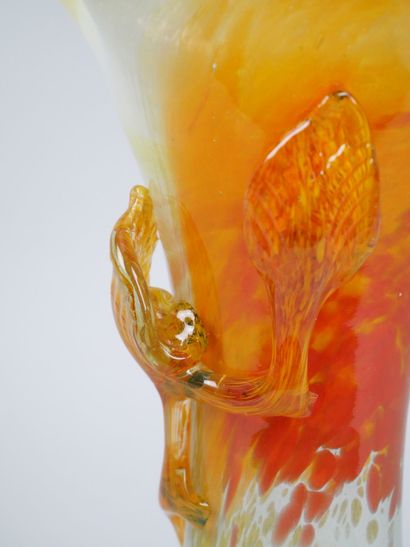 Orange-toned blown glass corolla vase decorated...