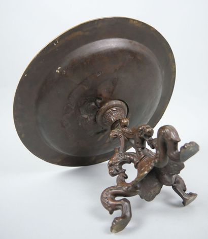 Bronze tripod bowl with relief decoration...