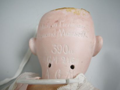 ARMAND MARSEILLE 
Porcelain-headed doll with...