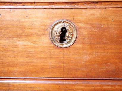 Molded walnut chest of drawers, opening with...