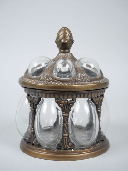 Oval blown-glass and metal cookie tin decorated...