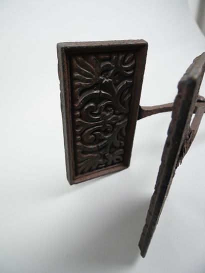 Cast iron waffle iron with foliage and fleur-de-lys...