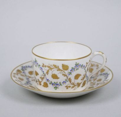 LE TALLEC 
Porcelain cup and saucer with...