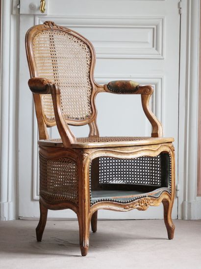 A molded and carved beechwood cabriolet-shaped...