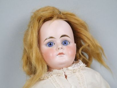 Porcelain head doll, fixed blue eyes, closed...