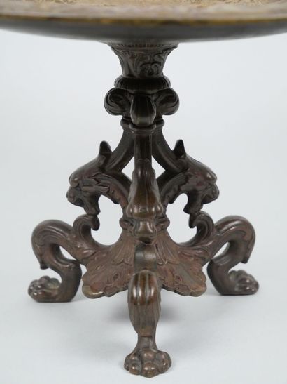 Bronze tripod bowl with relief decoration...