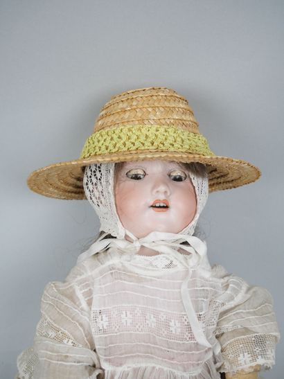 ARMAND MARSEILLE 
Porcelain-headed doll with...