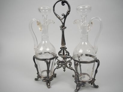 Pair of glass oil and vinegar cruets with...