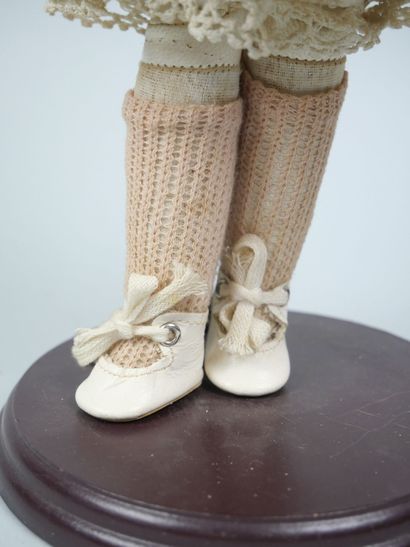 ARMAND MARSEILLE
Porcelain-headed doll with...