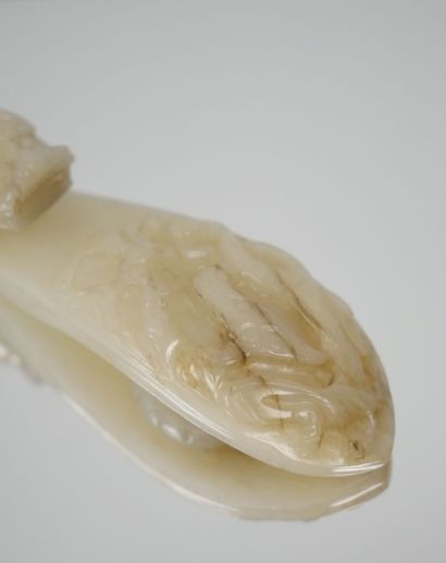 CHINA - 19th century
Celadon and brown-veined...